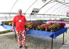 Troy Lucht of Plant Source International in front of the Heugera varieties they grow. They grow unrooted cuttings to the North American market and have production sites in Mexico and in the U.S. This year, they will add the Suntory breeder line to their list.